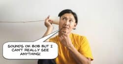 Man listening to string cup audio.