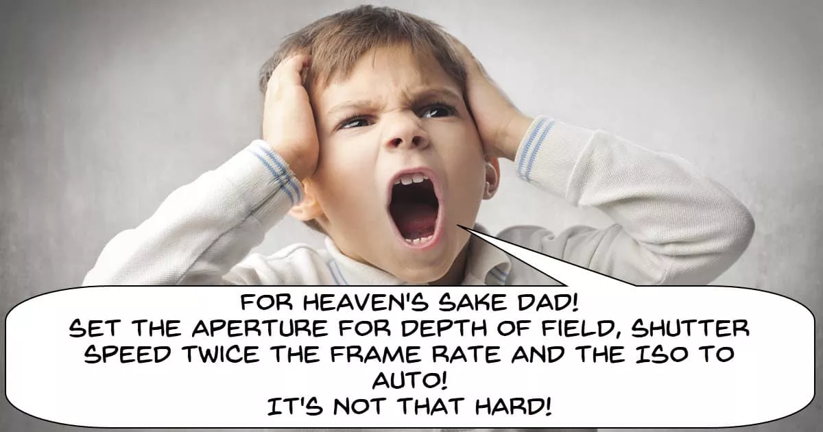 Boy yelling video camera basic settings at father.