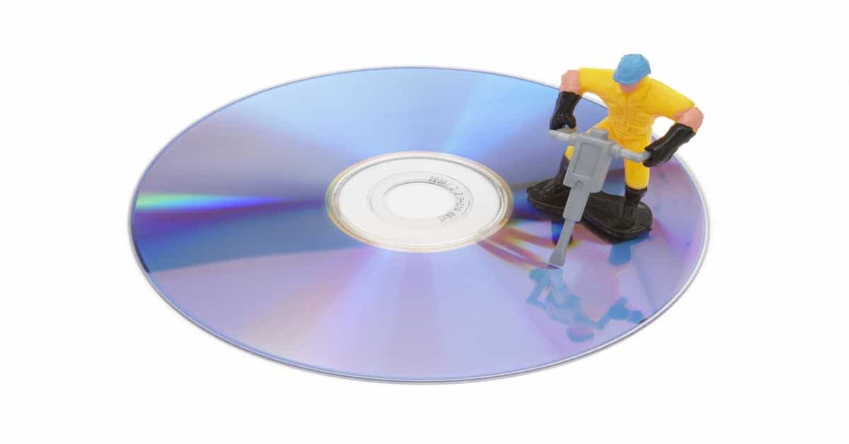 Worker repairing a DVD