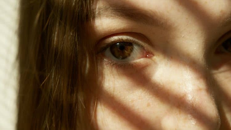 Image of a woman's eyes and upper face as an example of an extreme close-up shot.