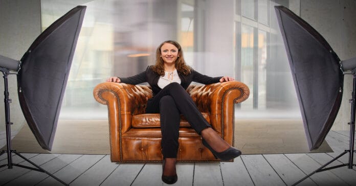 Woman being interviewed on camera.