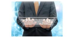 Man typing on a futuristic keyboard.