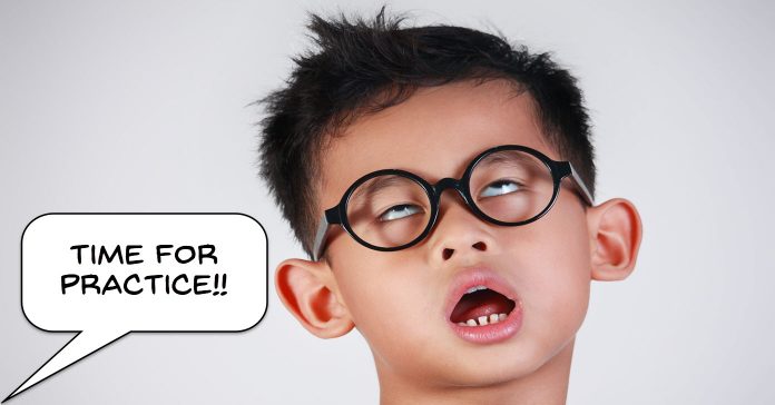 Humorous image of a boy pulling a face because of being told to practice. 