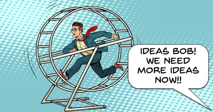 Man stuck on a hamster wheel of creating video ideas.